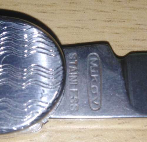 A Paper Knife and Mikov Pocket Knife with Fold Away Blades and Tools