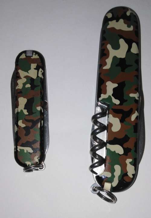 TWO CAMOUFLAGE VICTORINOX MULTI-TOOL KNIVES (SPARTAN AND CLASSIC MODELS)