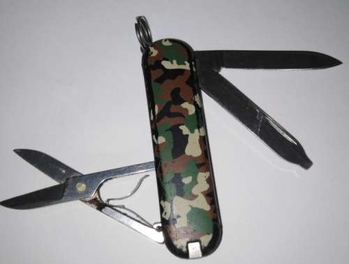 TWO CAMOUFLAGE VICTORINOX MULTI-TOOL KNIVES (SPARTAN AND CLASSIC MODELS)