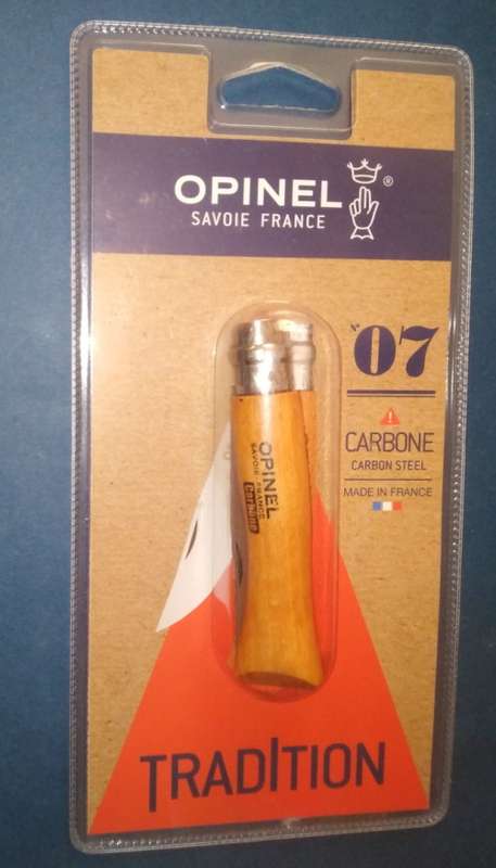 A Collection of Three Different Knives Still Sealed in Blister Packs