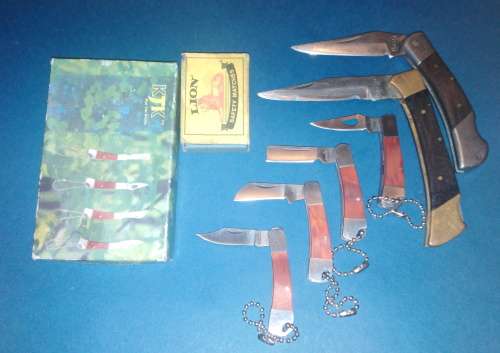 A Collection of Seven Folding Knives including 1 set of KTK Mini Knives