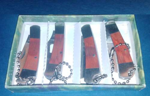 A Collection of Seven Folding Knives including 1 set of KTK Mini Knives