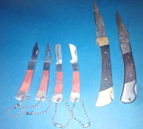 A Collection of Seven Folding Knives including 1 set of KTK Mini Knives