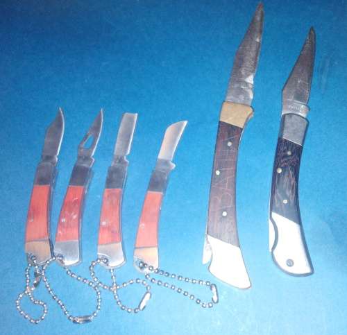 A Collection of Seven Folding Knives including 1 set of KTK Mini Knives