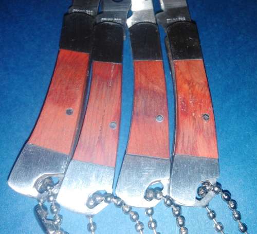 A Collection of Seven Folding Knives including 1 set of KTK Mini Knives