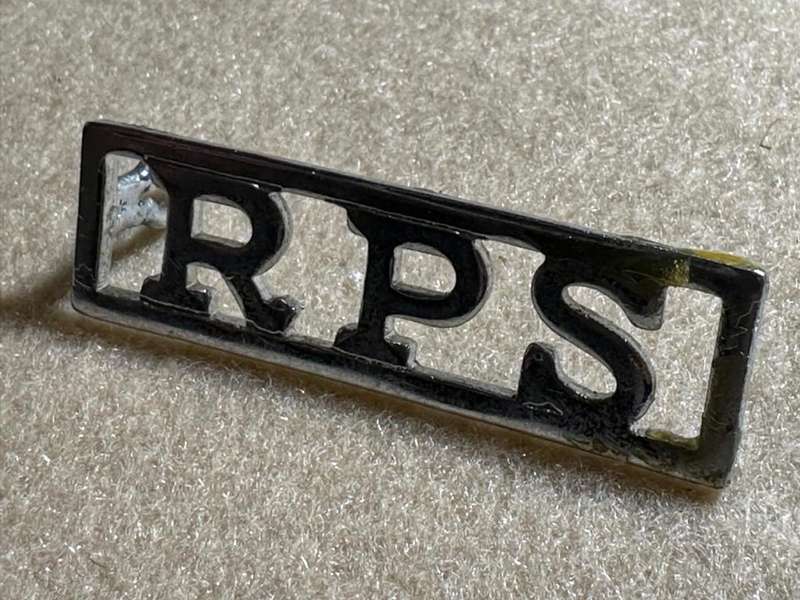 Rhodesian Prison Service - RPS CHROME SHOULDER TITLE, One lug missing