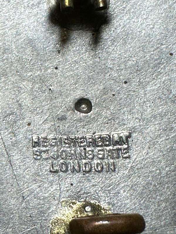 Rhodesian ST JOHNS - BERET BADGE METAL, Registered at St Johns Gate, London