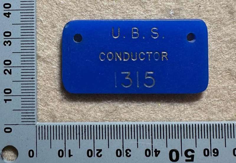 Rhodesian TRANSPORT - UBS CONDUCTOR BADGE PLASTIC - NO 1315