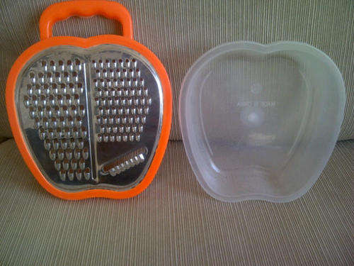 **** Cool Grater with inside Tupperware that stores everything you grate*** Nice item to have***