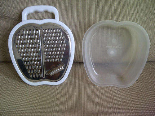 ****Cool Grater with Plastic Container that stores everything you grate*** Nice item to have***