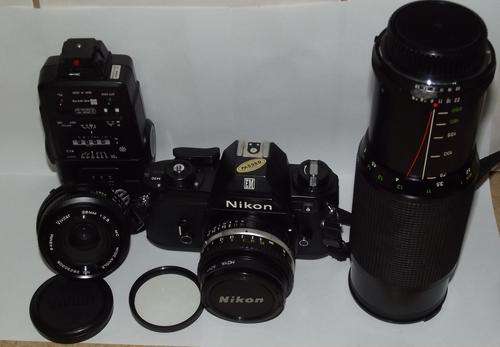 Nikon EM 35mm SLR Film Camera With Lenses and Flash Unit