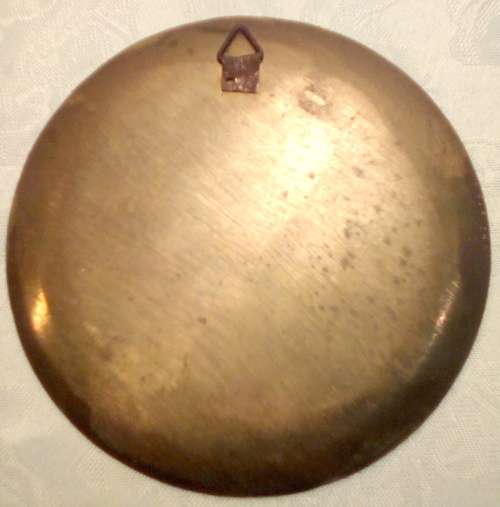 Unusual little metal colourful wall plate