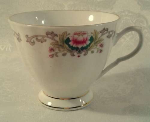 Set of four vintage  tea cups and saucers.
