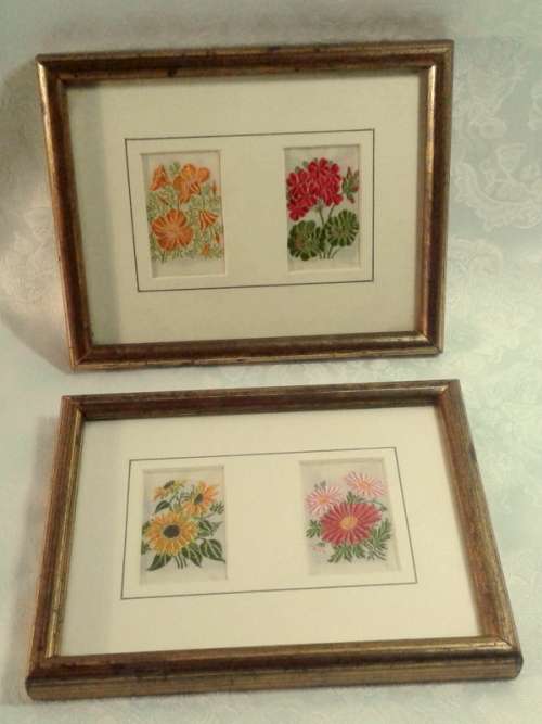 Two pretty pictures  with embroidery work.