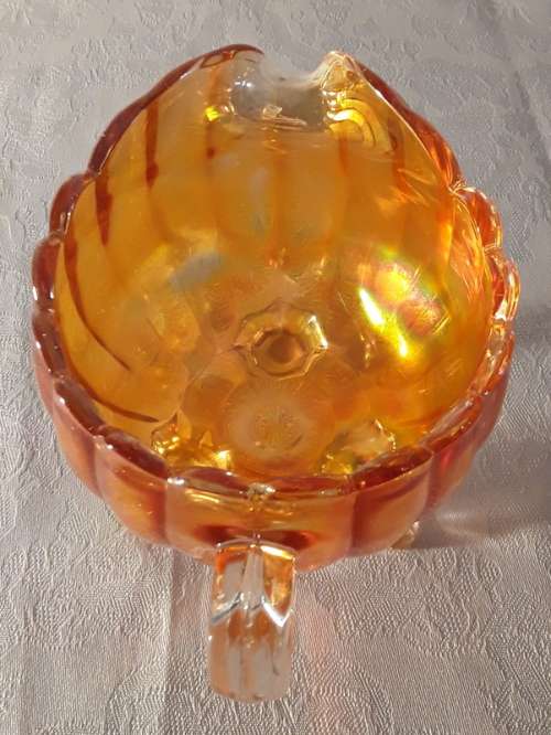 Beautiful bright orange coloured vintage carnival glass milk jug