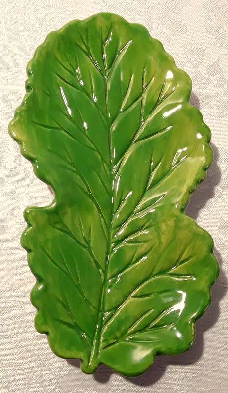Striking small leaf serving dish. Hand made and painted from Portugal.