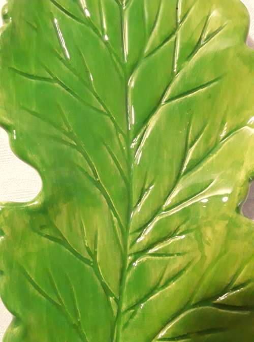 Striking small leaf serving dish. Hand made and painted from Portugal.