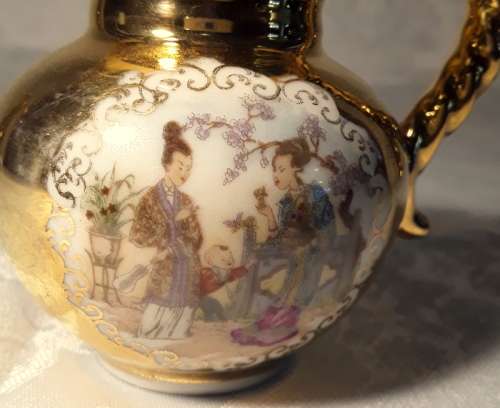 Stunning small oriental jug