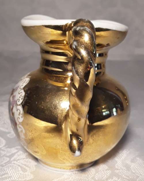 Stunning small oriental jug