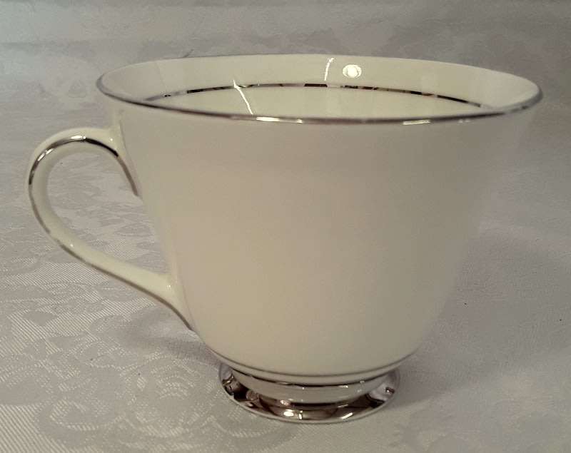 Vintage sophisticated white with silver  Royal Doulton trios (four)