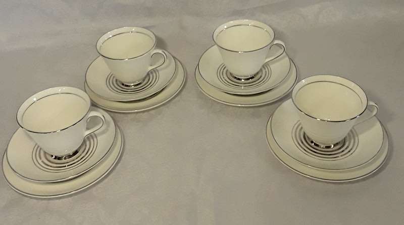 Vintage sophisticated white with silver  Royal Doulton trios (four)