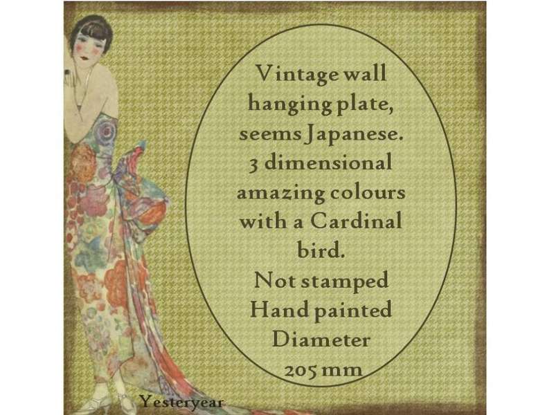 Vintage wall hanging plate, seems Japanese.  3 dimensional with a Cardinal bird.