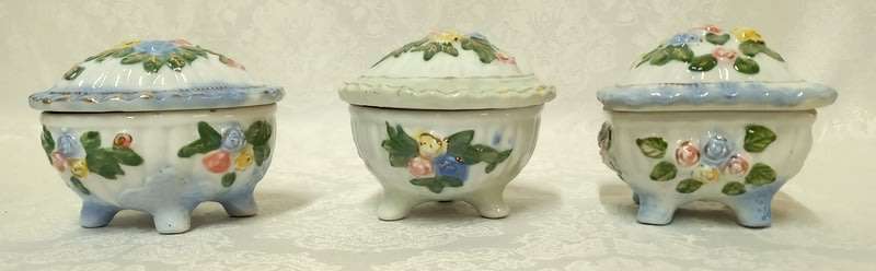 Three lidded pretty trinket dishes
