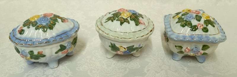 Three lidded pretty trinket dishes