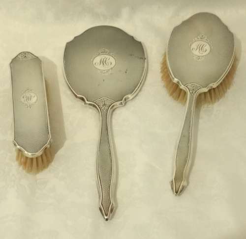Vintage Hallmarked Silver Brush Set Mirror and two brushes. All initialled with M and C. B and Co