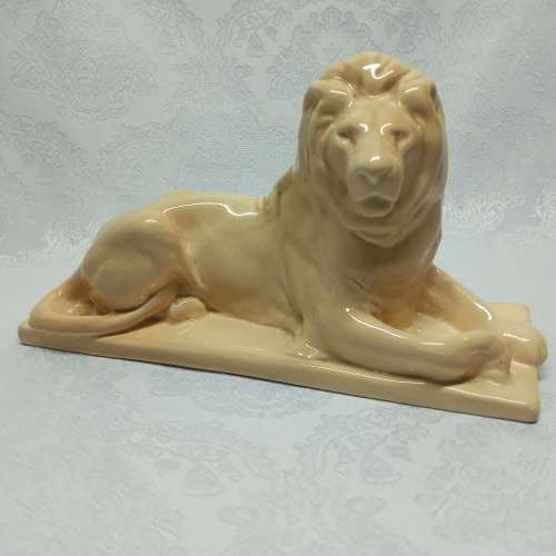 Ashtead Pottery glazed earthenware Model of a recumbent Lion by Sir William Reid Dick