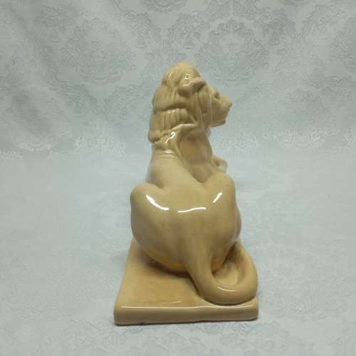 Ashtead Pottery glazed earthenware Model of a recumbent Lion by Sir William Reid Dick