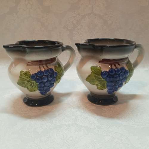 Vintage handmade and painted Italian creamers
