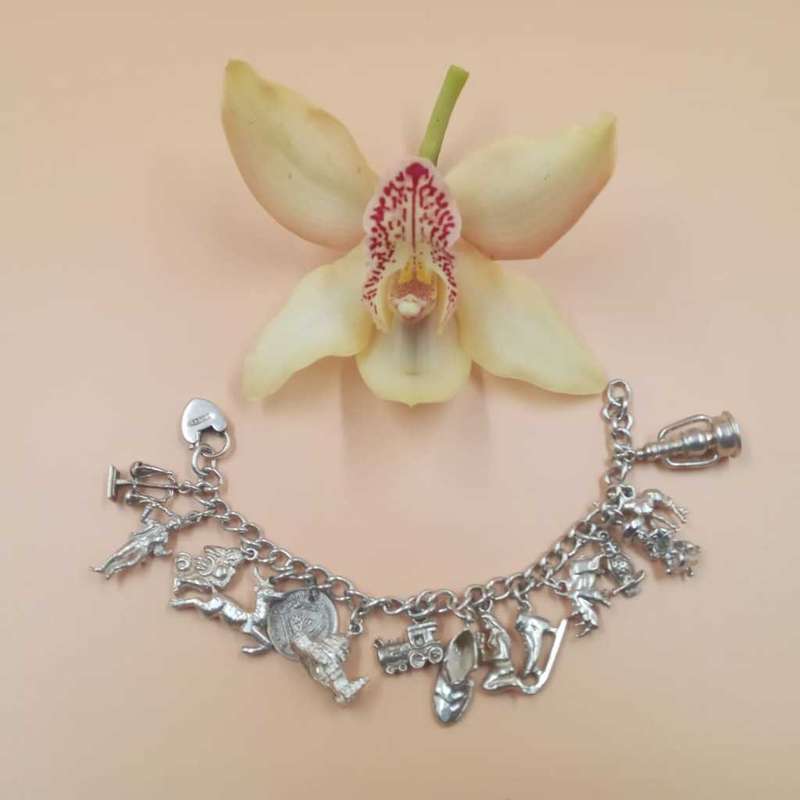 Charms Charm Bracelets Vintage Sterling Silver Charm Bracelet with a padlock closure. was sold for 980.00 on 18 Jan at 07 38 by Yesteryear in Wartburg ID 604600375