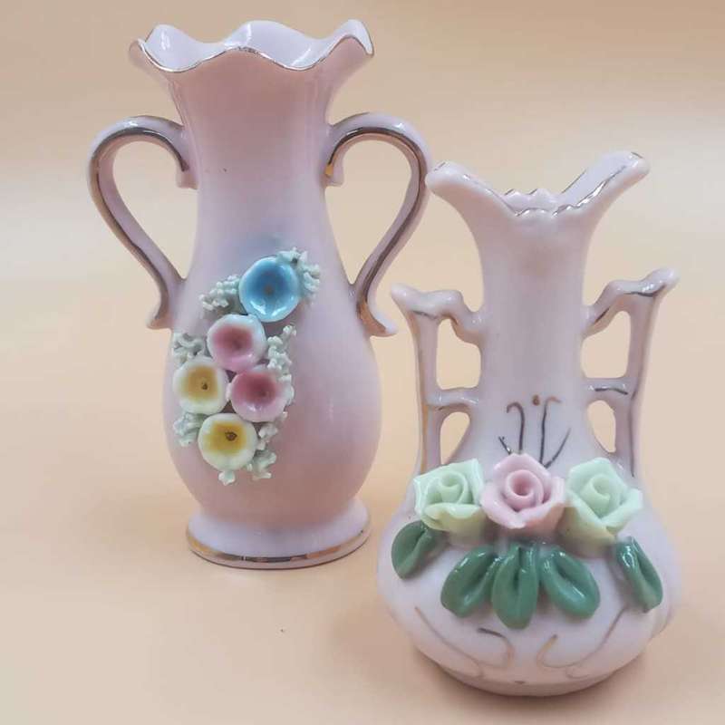 Small vintage pink display vases