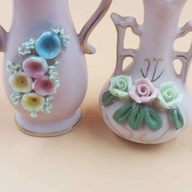 Small vintage pink display vases