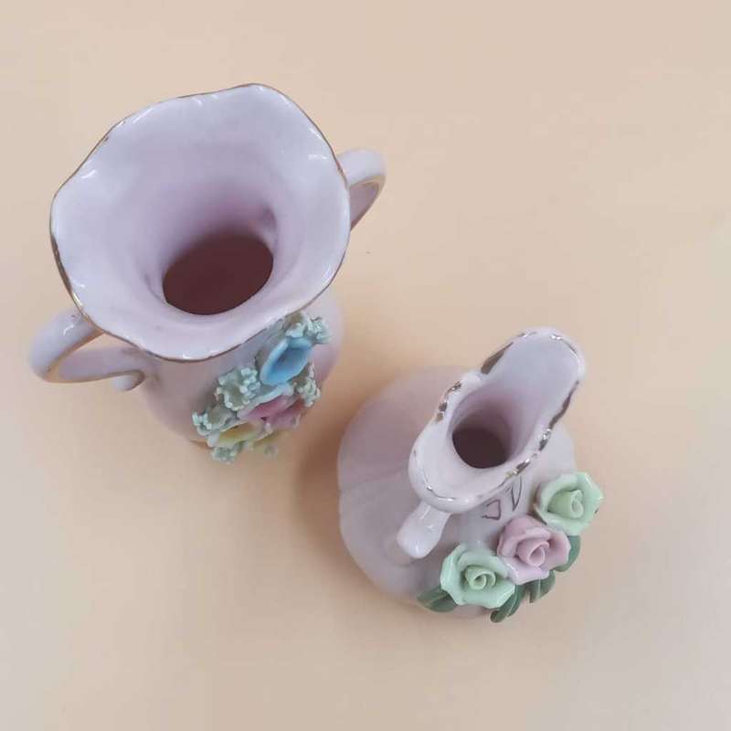Small vintage pink display vases