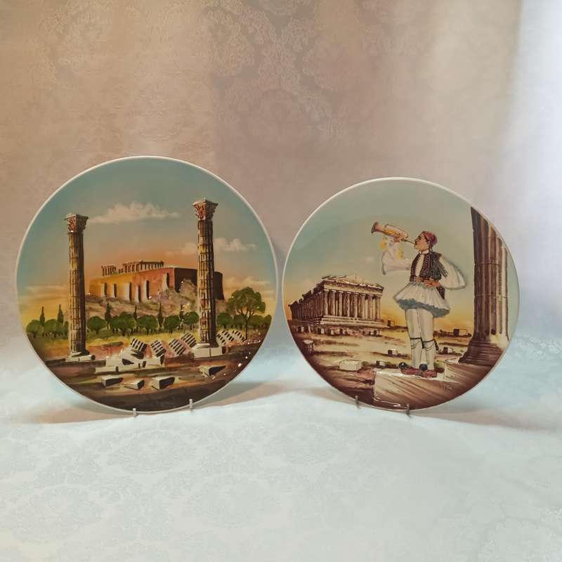 Two vintage handmade ceramic plates made in Athens, Greece.
