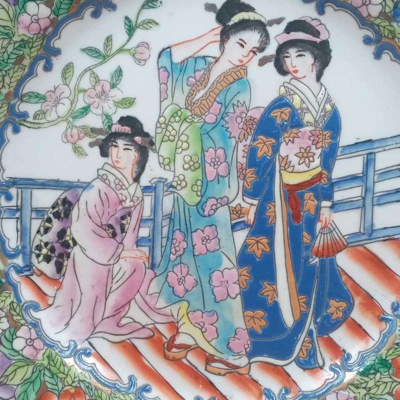 Vintage porcelain enameled Geisha Girl plate with Rose Medallion