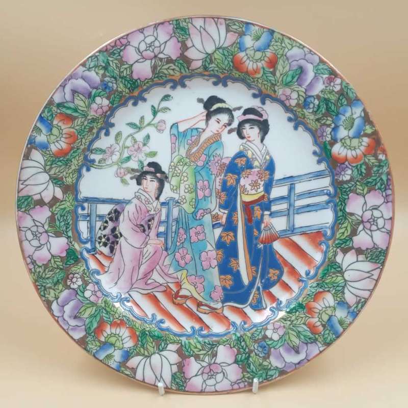 Vintage porcelain enameled Geisha Girl plate with Rose Medallion
