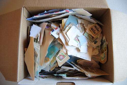 ASSORTED BOX OF USED WORLDWIDE STAMPS ON PAPER....See Pics!!!