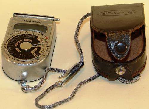 Vintage Sekonic L-6  Light Meter in working order with leather case  and metal chain