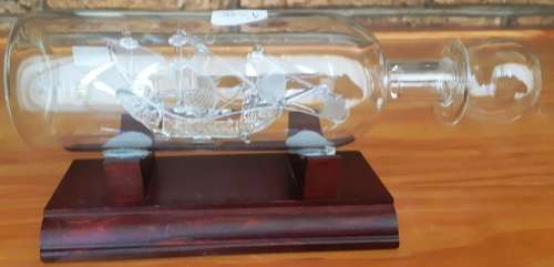 Santa Maria 1492 May Flower glass model ship in bottle on wooden stand-Made in Britain-good cond.