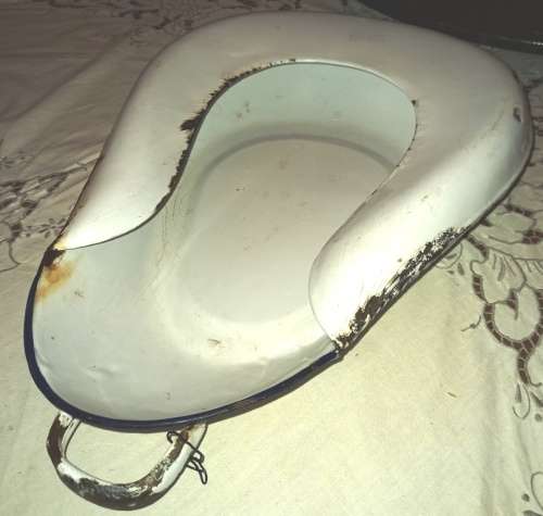 Antique white enamel bed pan from the 40`s with blue trimmings