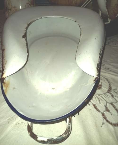 Antique white enamel bed pan from the 40`s with blue trimmings