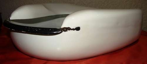 Vintage white enamel bed pan with black trimmings in good condition