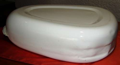 Vintage white enamel bed pan with black trimmings in good condition