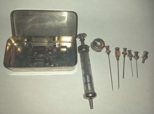 Vintage Original Record glass syringe with  different size needles in stainless steel box