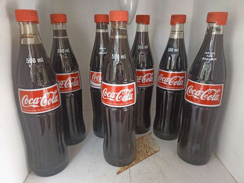 Lot-7- 500ml Coca Cola bottles-1995 Coca Cola Company-filled with substitute