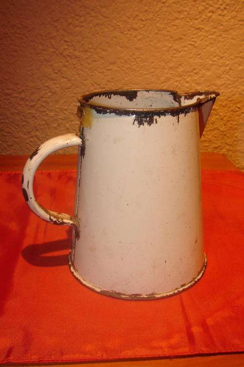 Vintage white Enamel Milk Jug with Black Trimming - Height 14cm