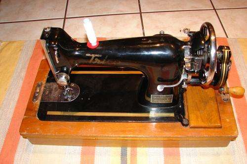 Trico Sewing Machine - Made in Europe,with wooden case in good condition and working order